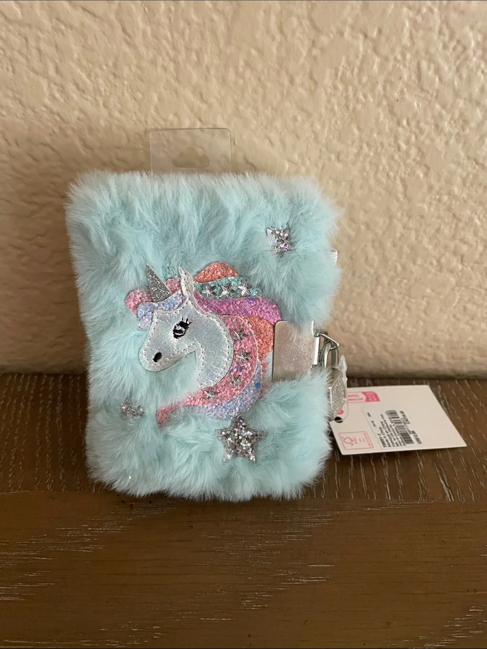 Claire's Mint Mini Fuzzy Unicorn Lock Notebook with Pink and Silver Accents
